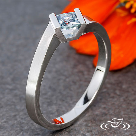 Modern Channel Set With A Twist Engagement Ring 