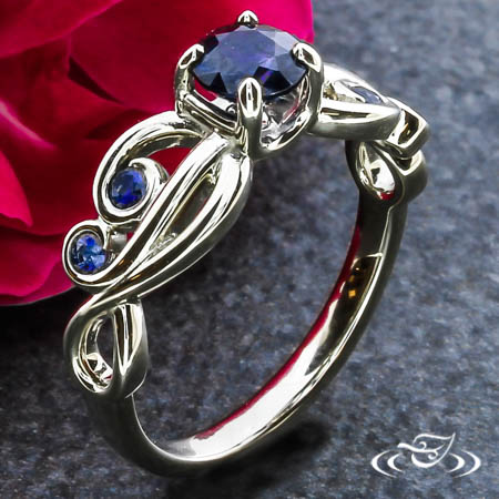 Sapphire And Swirl Engagement Ring