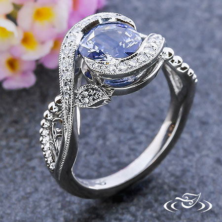 Blue Sapphire And Diamond Wrap Engagement Ring