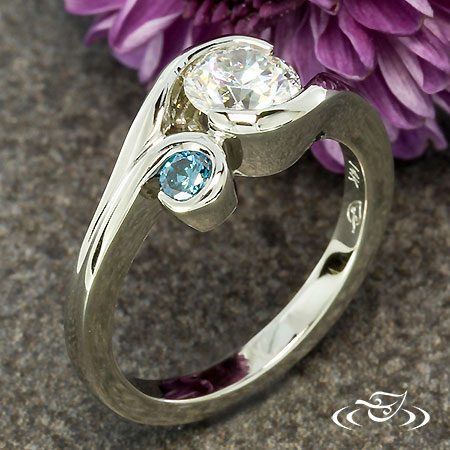 Wrap Style Engagement Ring With Blue Sapphire Accent