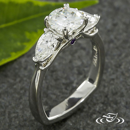 Pear Shaped Three Stone Engagement Ring