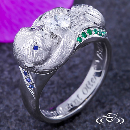 Carved Otter Ring With Emerald And Sapphire Waves