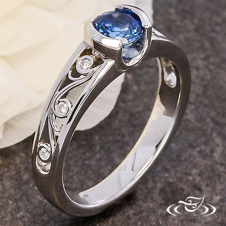 Blue Sapphire And Diamond Curl Engagement Ring