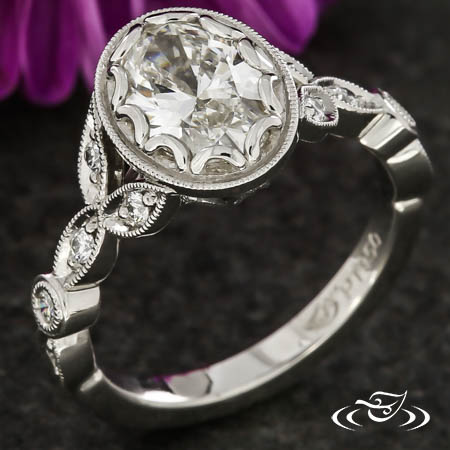 Antique Inspired Oval Solitaire With Scalloped Setting
