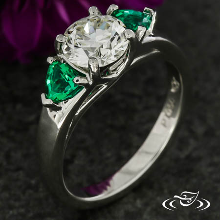 Emerald Trillion Three Stone Engagement Ring
