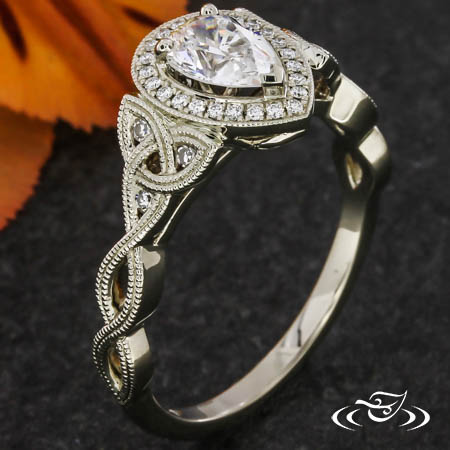 Pear Shaped Halo Ring With Celtic Knot Shoulders 