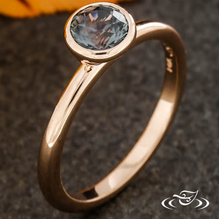 Bezel Set Rose Gold Ring With Lavender Sapphire