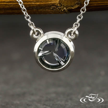 Carved Montana Sapphire Pendant
