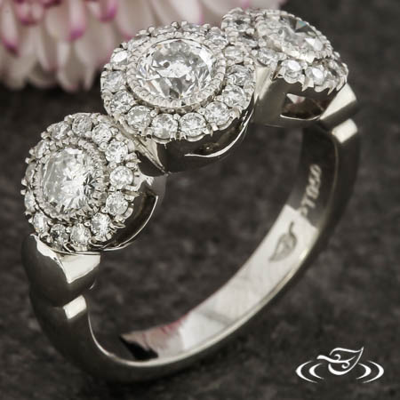 Three Stone Ring With French Set Halos