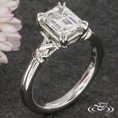Infinity Loop Engagement Ring With Emerald Cut Diamond