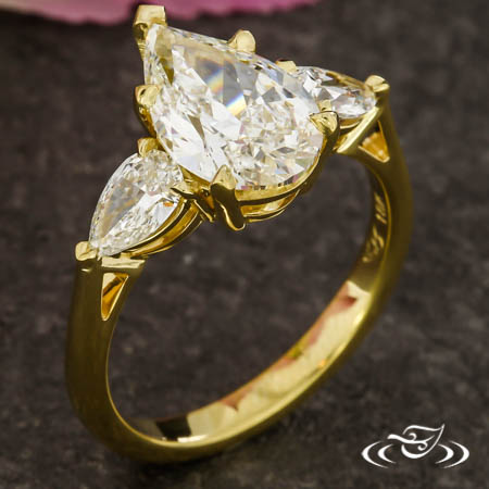 Three Stone Pear Shaped Engagement Ring