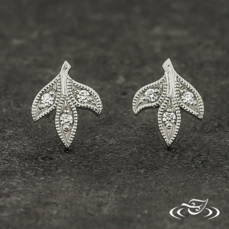 Platinum And Diamond Earrings With A Leaf Motif