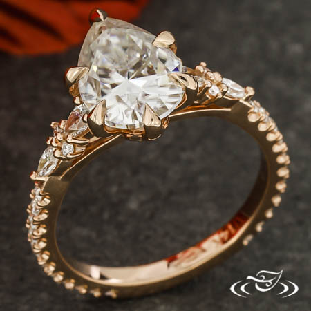 Pear Cut Engagement Ring With Cluster Accent Diamonds