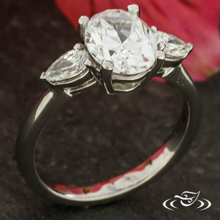 Three Stone Oval And Pear Ring