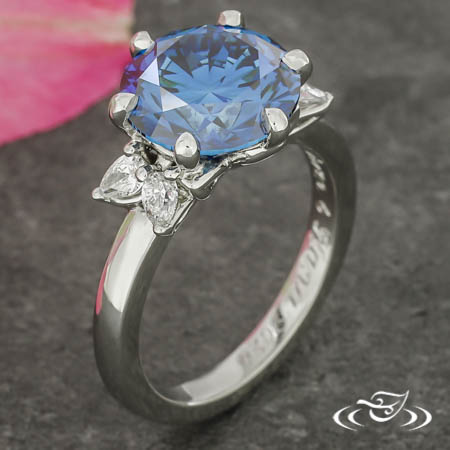 Blue Diamond Ring With Pear Diamond Shoulders