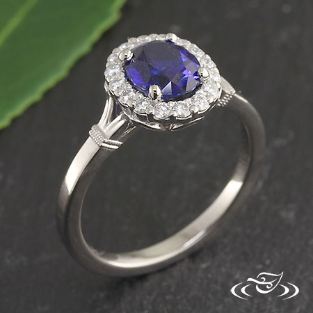Palladium Sapphire Ring With Diamond Halo